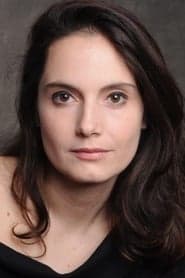 Eugenia Caruso as Shop Clerk in Shelter 2026
