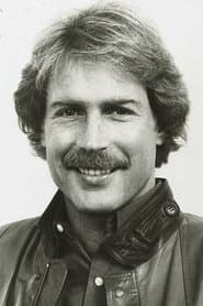 Thomas Brunelle as Anchorman in Misery 1990