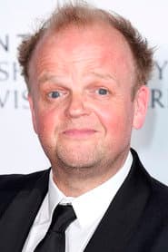 Toby Jones as Claudius Templesmith in The Hunger Games: Catching Fire 2013